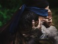 Sandra Bullock, left, stars in Netflix's "Bird Box." (Netflix)