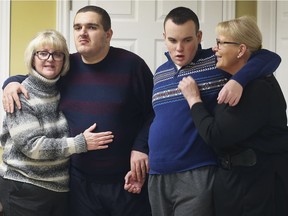 Windsor West MPP Lisa Gretzky held a news conference on Dec. 7, 2018, with local families to promote her new private member's bill, Noah and Gregory's Law, which seeks timelier support for families with adult children with developmental disabilities. Shown here are Windsor moms Michelle Helou, left, with her son Noah, and Mary Beth Rocheleau, with her son Gregory.