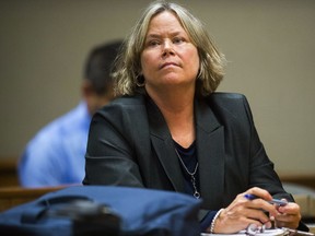 Dr. Eden Wells, chief medical executive of the Michigan Department of Health and Human Services, appears in court for the first day of her preliminary examination on Monday, Oct. 9, 2017, in District Court in Flint, Mich. The hearing was postponed when prosecutors said they would add a charge of involuntary manslaughter.
