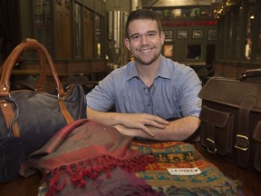 Dylan Verburg, a University of Windsor student, displays products he imported from India, such a various textiles, and buffalo leather handbags, before the start of Windsor Soup at the Walkerville Brewery, Sunday, November 25, 2018.  Verburg returned from India and started INpact Collective.