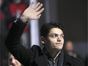 Former Windsor Spitfire goalie Michael DiPietro waves to the crowd during a pre-game ceremony on Thursday, December 6, 2018, at the WFCU Centre in Windsor. DiPietro was traded to the Ottawa 67's.