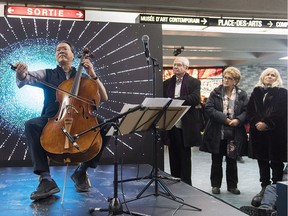 Famed cellist Yo-Yo Ma performs at a subway station in Montreal, Dec. 8, 2018.