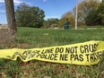 Police tape near where Sara Anne Widholm was found on the Ganatchio Trail in Windsor on Oct. 8, 2017.