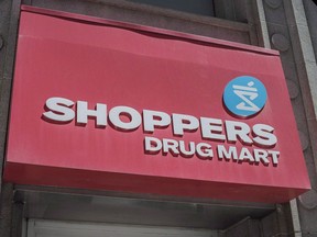 The logo for Shoppers Drug Mart is shown in downtown Toronto in this May 24, 2016, file photo. Shoppers Drug Mart has been granted a licence to sell medical marijuana online.