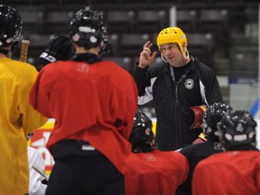 Jeff Perry is shown coaching a Lambton County AAA minor hockey team in this 2013 file photo.