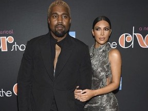 Kanye West, left, and Kim Kardashian West attend "The Cher Show" Broadway musical opening night at the Neil Simon Theatre on Monday, Dec. 3, 2018, in New York.