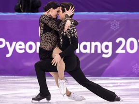 Canada's Tessa Virtue and Scott Moir perform in the ice dance figure skating short program at the Pyeonchang Winter Olympics Monday, Feb. 19, 2018 in Gangneung, South Korea.