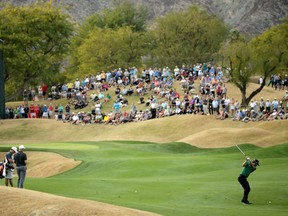 Adam Hadwin of Canada hits his second shot on the 15th fairway during the final round of the Desert Classic at the Stadium Course on Jan. 20, 2019, in La Quinta, California.