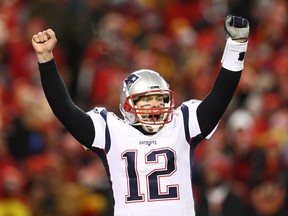 Tom Brady of the New England Patriots celebrates after defeating the Kansas City Chiefs in overtime during the AFC Championship Game at Arrowhead Stadium on Jan. 20, 2019 in Kansas City, Missouri. The Patriots defeated the Chiefs 37-31.