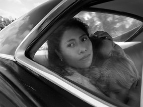 Marco Graf, Yalitza Aparicio, and Daniela Demesa in Roma. (Netflix)