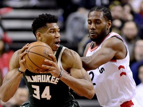 Raptors forward Kawhi Leonard (right) and Milwaukee Bucks' Giannis Antetokounmpo are easy choices for the all-star game. (THE CANADIAN PRESS)
