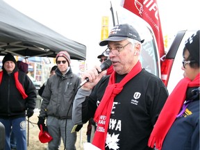 Arbitration start. Phil Lyons, president of Canadian Union of Postal Workers Local 630 in Windsor, speaks during a roadside Day of Action rally outside the Windsor Mail Processing Plant on Walker Road on Jan. 16, 2019. The posties were protesting the start of arbitration in a labour dispute that saw the federal government pass back-to-work legislation in late November after five weeks of workplace action. Brian Hogan, second left, president of Windsor and District Labour Council, also spoke to about 20 rally attendees.