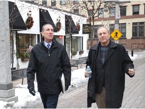 Mr. Fix It. Consultant Peter Bellmio, left, strolls down Maiden Lane with outgoing Downtown Windsor BIA chairman Larry Horwitz on Jan. 24, 2019. Bellmio was hired by the DWBIA to assess the needs of the downtown relating to safety, security and quality of life. The urban expert is holding dozens of interviews with a range of stakeholders.