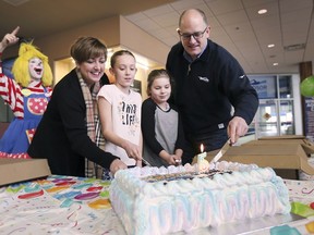 The Adventure Bay Family Water Park in Windsor, ON. celebrated its 5th anniversary on Saturday, January 19, 2019. Beth Ann Prince, left, Manager, Community Investment and Member Engagement at WFCU Credit Union, Annika Konopaski, 10, (who named the facility), Kamilla Merrow, 10, (who named the mascot) and Mayor Drew Dilkens cut the celebratory cake during the event.