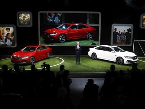Scott Keogh, President and CEO, Volkswagen Group of America, Inc., introduces the 2020 Volkswagen Passat during media previews for the North American International Auto Show in Detroit on Jan. 14, 2019.