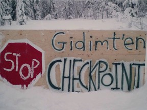 A sign for a blockade checkpoint by the Gidimt'en clan of the Wet'suwet'en First Nation is shown in this undated handout photo posted on the Wet'suwet'en Access Point on Gidumt'en Territory Facebook page.
