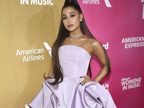 FILE - In this Thursday, Dec. 6, 2018 file photo, Ariana Grande attends the 13th annual Billboard Women in Music event at Pier 36, in New York. The organizers of the 2019 Coachella Valley Music and Arts Festival have announced the top acts scheduled to appear at the multiday event in April. Goldenvoice, the promoter of the event, said Wednesday night, Jan. 2, 2019, that the big names scheduled to perform at the two-weekend event from April 12 to April 14 and from April 19 to April 21 include Grande, Childish Gambino, Tame Impala and Janelle Monae.