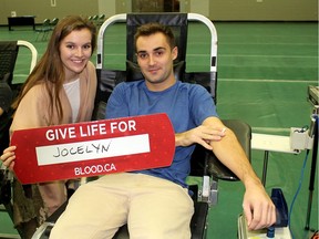 Hilary Pomajba, 19, and Adriano Bernardi, 21, were among the many friends who took part in a blood donor clinic in honour of Jocelyn McGlynn, 21, who is battling leukemia, that was held at the St. Clair College HealthPlex in Chatham, Ont. on Dec. 22, 2018.