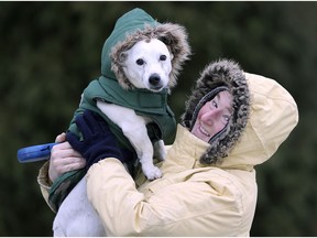 With matching fur-trimmed parkas to keep out the cold, Rennee Frances and her pooch Kasper were dressed for the elements while enjoying a walk along Riverside Drive East on Jan. 24, 2019.