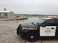 An OPP cruiser is on the scene at Colchester Harbour where two people were sent to hospital after a vehicle went into the water, Tuesday, Jan. 15, 2019.