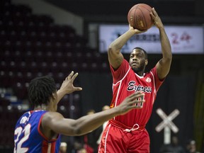 WINDSOR, ONT:. JANUARY 9, 2019 - Windsor's Chris Jones takes a shot over Cape Breton's Tanner Giddings in NBLC action between the Windsor Express and the Cape Breton Highlanders at the WFCU Centre, Wednesday, January 9, 2019.