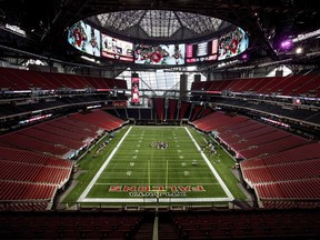 FILE - In this Aug. 15, 2017, file photo, Mercedes-Benz Stadium, the new home of the Atlanta Falcons football team and the Atlanta United soccer team, stands in Atlanta.