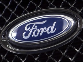 The Ford logo on a vehicle at a dealership in Hialeah, Fla. on Aug. 21, 2014. Ford Motor Company of Canada Ltd. has named Dean Stoneley as its next president and chief executive.