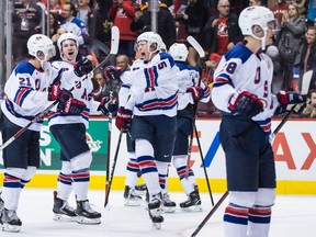 United States' Noah Cates, left, Mattias Samuelsson, Jason Robertson and Joel Farabee celebrate after the U.S. defeated Russia during semifinal IIHF world junior hockey championship action in Vancouver on Jan. 4, 2019.