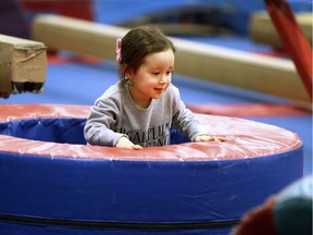 Addison Ellwood, 2, checks out the gymnastic equipment during the Central Park's New Year's Experience event on Monday, December 31, 2018, at the Central Park Athletics facility in Windsor.