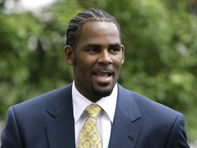 FILE - This June 13, 2008 file photo shows R&B singer R. Kelly arriving at 3the Cook County Criminal Court Building in Chicago. Kelly, one of the top-selling recording artists of all time, has been hounded for years by allegations of sexual misconduct involving women and underage girls _ accusations he and his attorneys have long denied. But an Illinois prosecutor's plea for potential victims and witnesses to come forward has sparked hope among some advocates that the R&B star might face new charges.