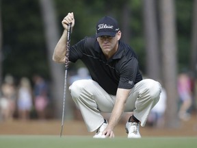 In this June 13, 2014, file photo, Chris Thompson is shown during the second round of the U.S. Open golf tournament in Pinehurst, N.C. The Sony Open really is paradise for Thompson, who could have swam to Hawaii faster than it took him to reach the PGA Tour. He turned pro in 1999. Twenty years later, he finally is teeing it up along with the elite in golf.
