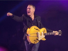 Bryan Adams performs during the Invictus Games closing ceremony in Toronto on Sept. 30, 2017. Rocker and composer Adams surprised a sold-out audience at the Broadway show "Pretty Woman: The Musical" with a performance during the curtain call.