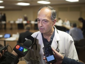 Dr. Anil Dhar, vice-president of professional staff at Windsor Regional Hospital, updates the media on flu cases following a Windsor Regional Hospital board of directors meeting at Met Campus, Thursday, January 10, 2019.