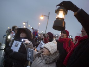 Lights across the river. A vigil in support of the Women's March was held Jan. 17, 2019, along Windsor's waterfront, in conjunction with a similar gathering across the Detroit River by Women's March Michigan, to honour women who have been murdered, gone missing, been incarcerated or deported.