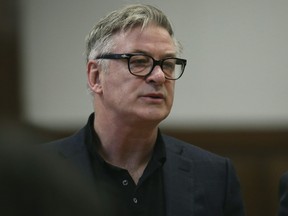 Actor Alec Baldwin stands in a New York City court, Wednesday, Jan. 23, 2019, for a hearing on charges that he slugged a man during a dispute over a parking spot last fall. (Alec Tabac/The Daily News via AP, Pool)