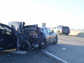 A photo of the crash scene on Highway 401 near Highway 77 on Dec. 23, 2017, when an unmarked Essex County police cruiser that was stopped on the shoulder of the highway was rear-ended by a civilian vehicle.