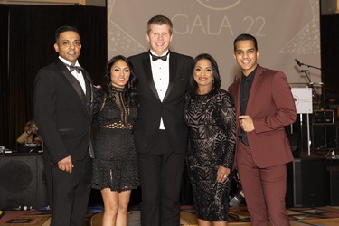 From left: Nauman Ali, Afshin Ali, Dave and Amber Hunter, and Zishan Ali.