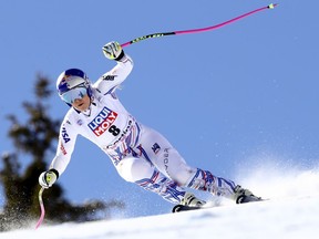 Lindsey Vonn speeds down the course during an alpine ski, women's World Cup super-G in Cortina D'Ampezzo, Italy, Sunday, Jan. 20, 2019.