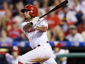 In this Sept. 14, 2016, file photo, Phillies' Freddy Galvis follows through on a two-run home run off Pirates pitcher Steven Brault during MLB action in Philadelphia.