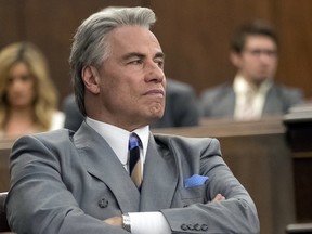This image released by Vertical Entertainment shows John Travolta in a scene from "Gotti." (Brian Douglas/Vertical Entertainment via AP)