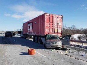 The aftermath of a fatal collision between a Mazda vehicle and the rear of a heavy tractor trailer in the eastbound lanes of Highway 401 near Tilbury on Jan. 21, 2019.