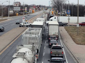 Transport trucks congest the northbound lanes of Huron Church Road in Windsor on the morning of Jan. 17, 2019.