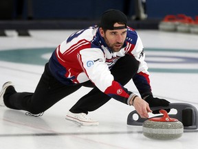 In this Jan. 3, 2019 photo, former Minnesota Vikings player Jared Allen practices with his curling team for a competition in Blaine, Minn. (AP Photo/Jim Mone)