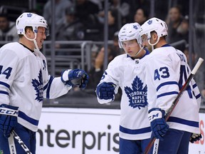 Toronto players celebrate a power-play goal against the Los Angeles Kings on Nov. 13. The Maple Leafs have had just 121 power plays through 48 games, the least in the NHL. (Harry How/Getty Images)