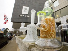 Marijuana bongs placed outside London city hall. London is among the Ontario municipalities that will allow marijuana retailers to operate. (Photo illustration/Mike Hensen/The London Free Press)