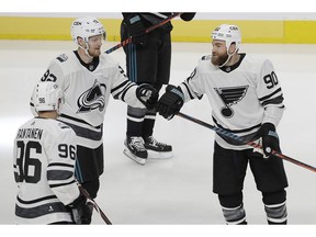 Central Division's Gabriel Landeskog, top left, of the Colorado Avalanche, is congratulated by Mikko Rantanen (96) and Ryan O'Reilly after scoring a goal against the Pacific Division during a semifinal in the NHL hockey All-Star Game in San Jose, Calif., Saturday, Jan. 26, 2019.