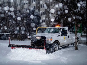 A pickup truck equipped with a snow plow blade in Grand Rapids, Michigan, on Jan. 28, 2019.