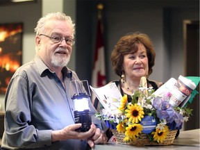 Richard Hewitt, left, and Pat Sherman of Welcome Wagon display items they arrive with on visits to families February 5, 2019.