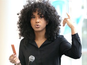 Host Serina Green, top, discusses her methods during a natural hair workshop at the University of Windsor CAW Commons on Wednesday as part of the 14th Afrofest. The week-long celebration, in conjunction with African Heritage Month, features visual art, music, panel discussions, guest speakers, film, fashion, food, dancing and spoken word. It wraps up Friday with a 90s-theme dance party at Imperial Night Club. For more info, go to uwsa.ca/afrofest19.