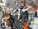 Ford team leader Rino Fanella works on the new, 7.3L V-8 engine at Ford Windsor Engine Plant Annex site Feb. 7, 2019.